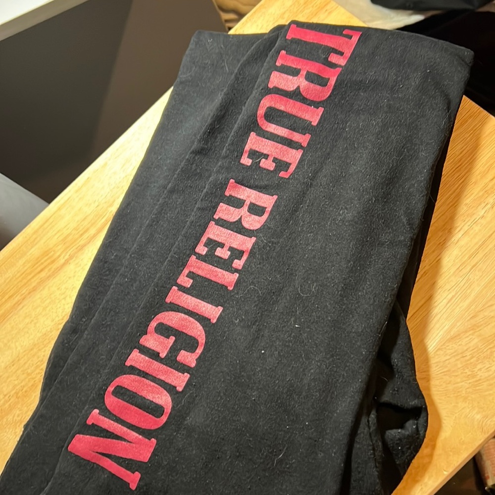 Black with red lettering True Religion sweatpants size small, worn a few.